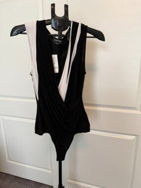 NWT Bebe Sleeveless Boddy Suit (Sz M)